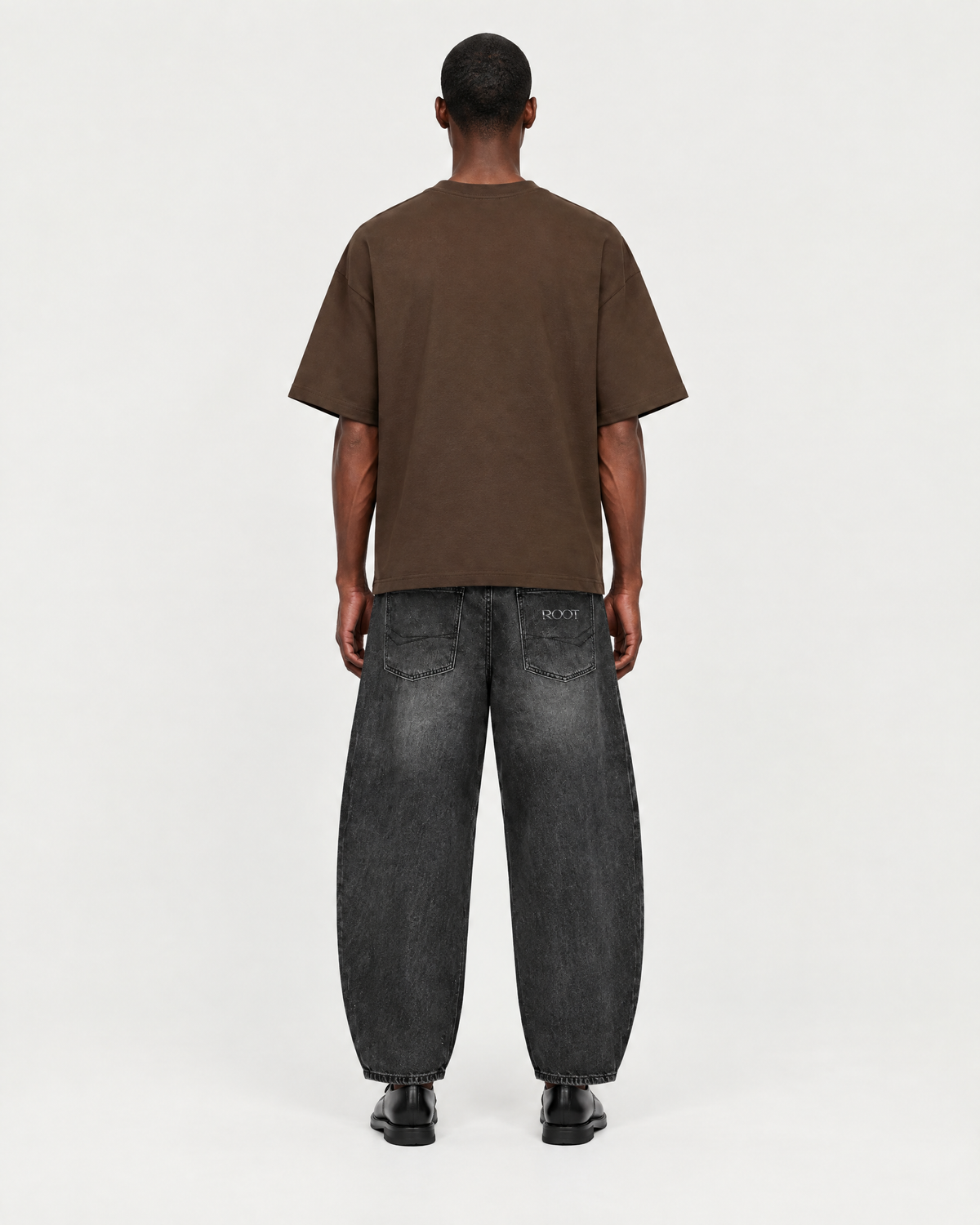 Roots Tee in Coffee, on model back