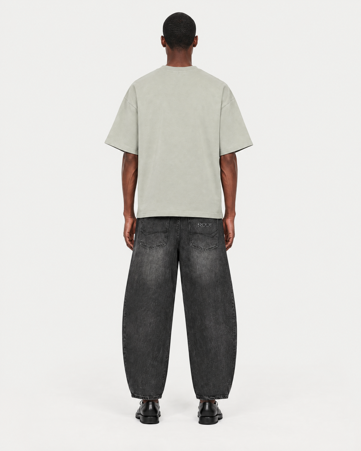 Roots Tee in Gray Green, on model back