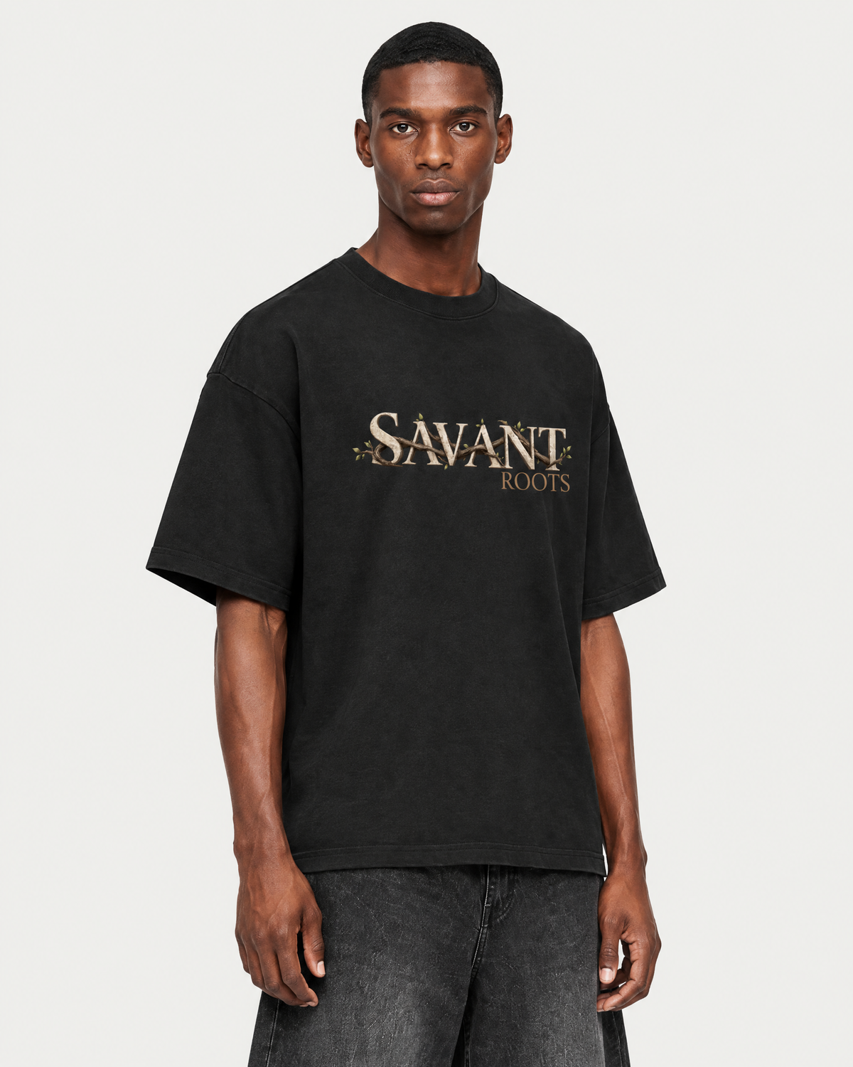 Roots Tee in Classic Black, on model detail