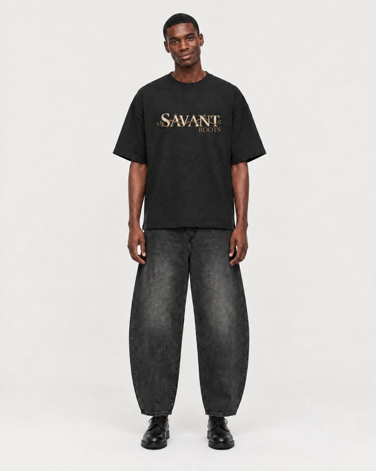 Roots Tee in Classic Black, on model front