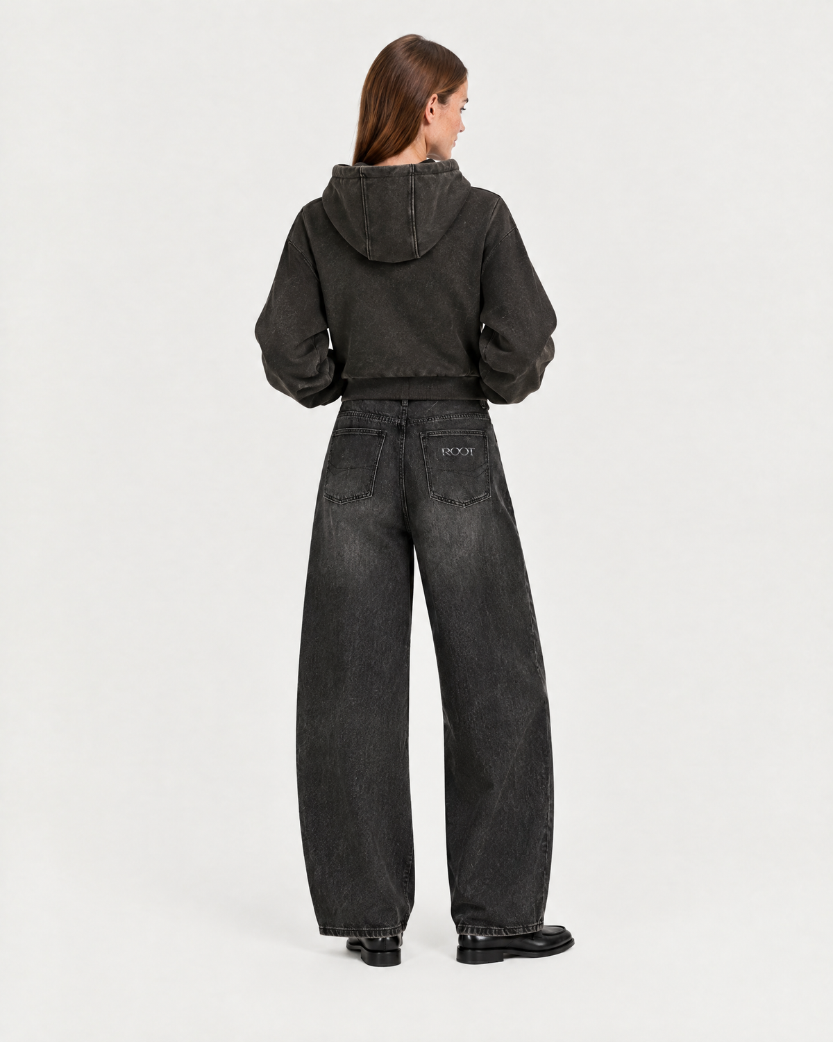 Washed Zip Hoodie in Black, on model back